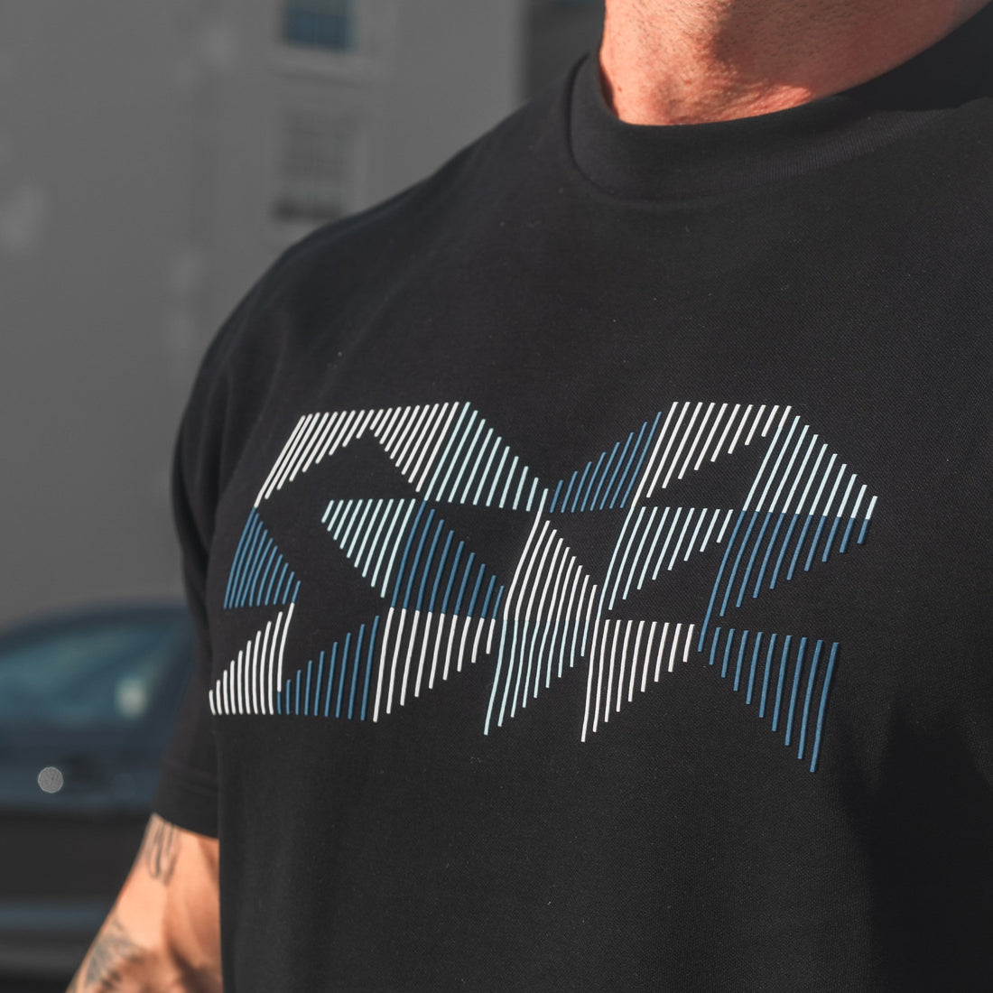 Dynamic Motion Platinum Tee